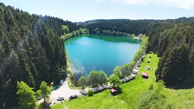 Artvin’in Şavşat ilçesinde yer alan Karagöl’de düzenlenen etkinlikte sporcular, göl
