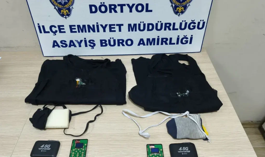 Hatay’ın Dörtyol ilçesinde düzenlenen ehliyet sınavında, üzerlerine kurdukları özel düzenekle