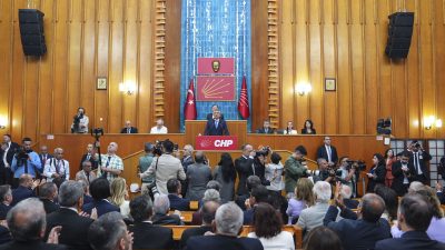 Wait, the raw text says: “Bu sözlerin ardından aralarında grup